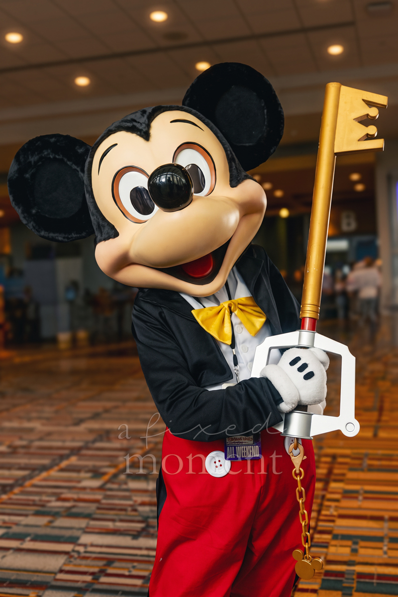 Mickey Mouse holding the Kingdom Key D by needlemousemascots at ConnectiCon 2026