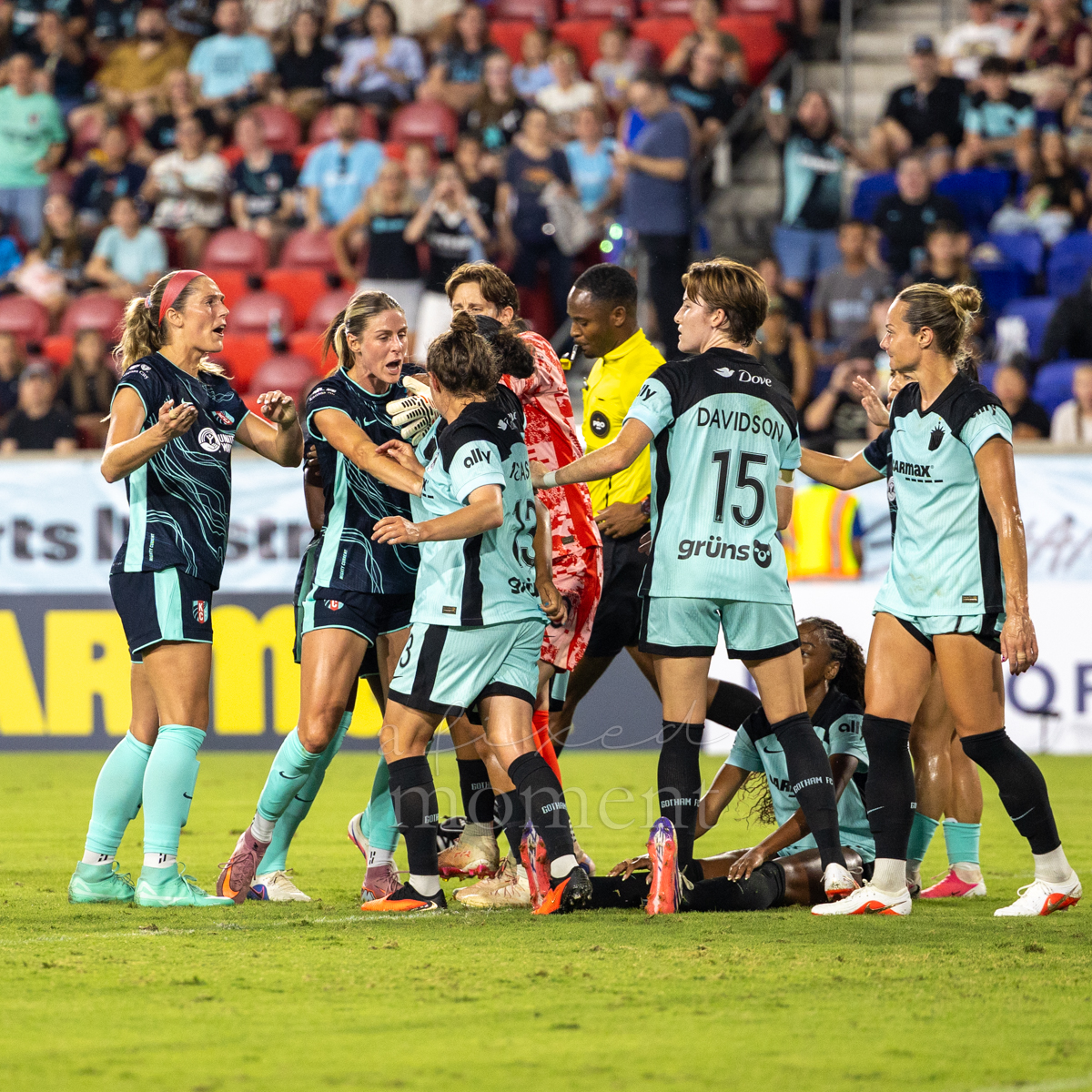Players appeal to the referee during Gotham FC's match against Kansas City Current