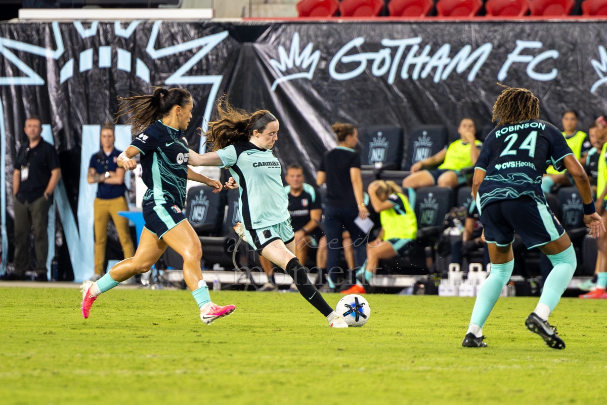 Rose Lavelle kicks the ball for Gotham FC against Kansas City Current