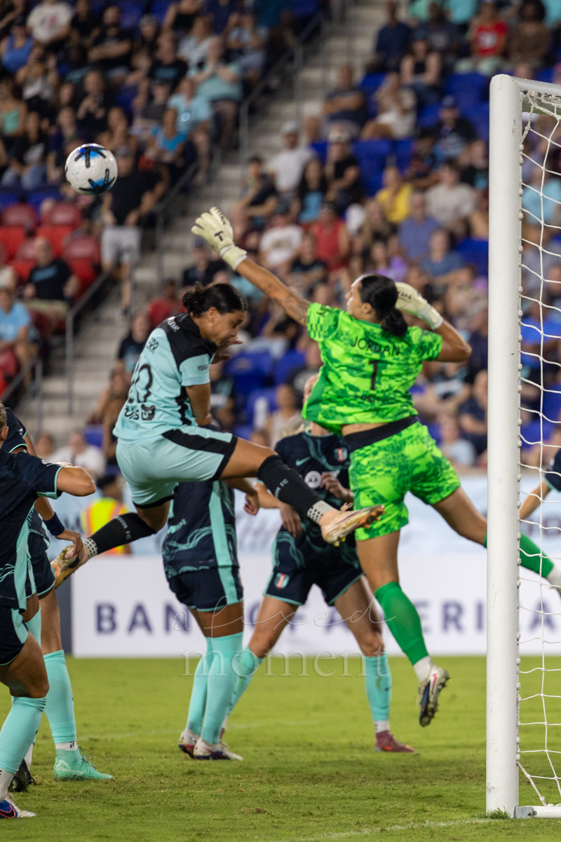 Sam Kerr challenges for the ball in front of goal during Gotham FC's match against Kansas City Current