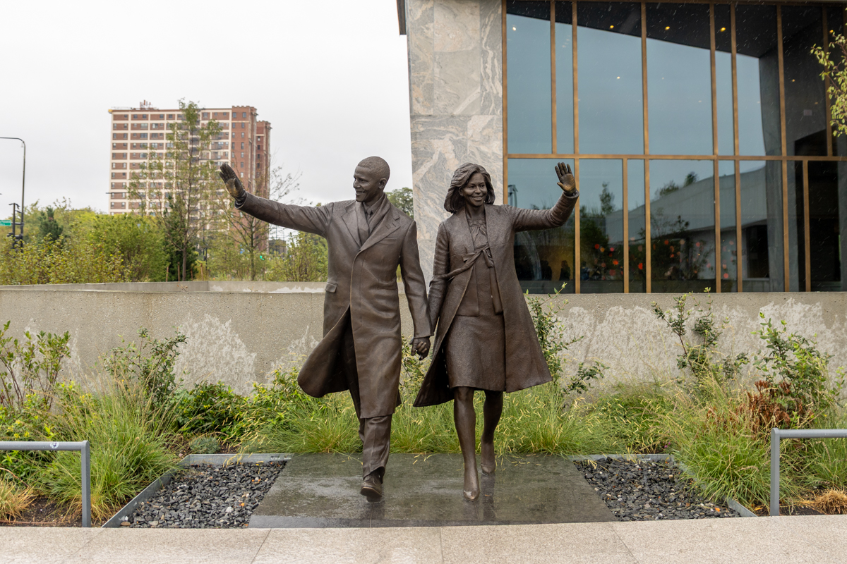 Bronze sculpture of Barack and Michelle Obama at the Obama Presidential Center
