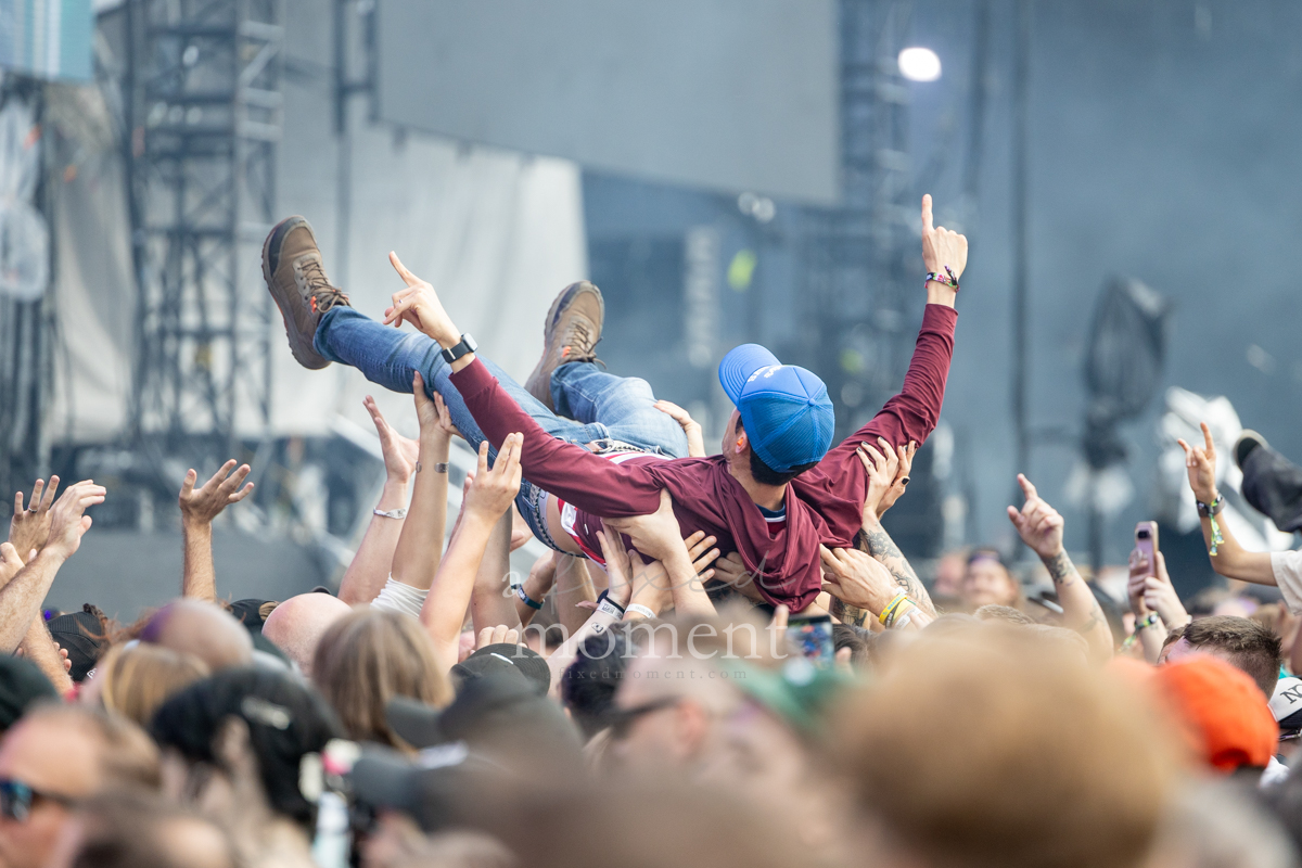 Fans crowd surf during Alkaline Trio at Riot Fest 2026