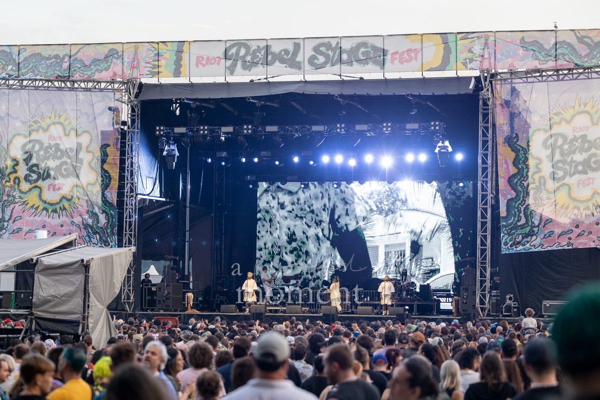 Wide view of Santigold performing for the Riot Fest crowd