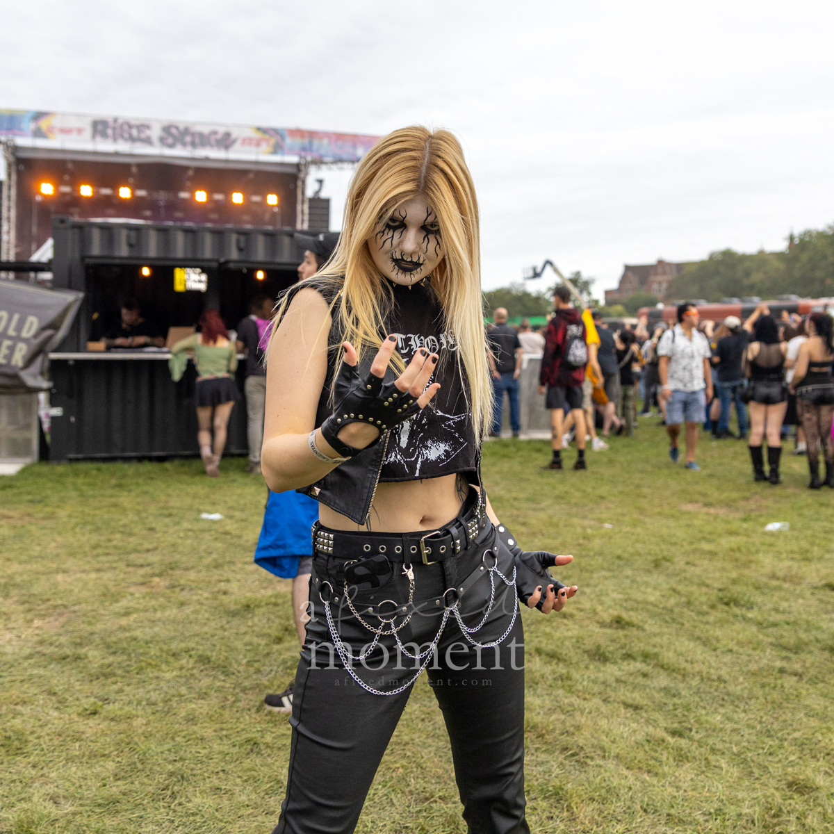 Festivalgoer in goth and punk-inspired fashion poses at Riot Fest 2026