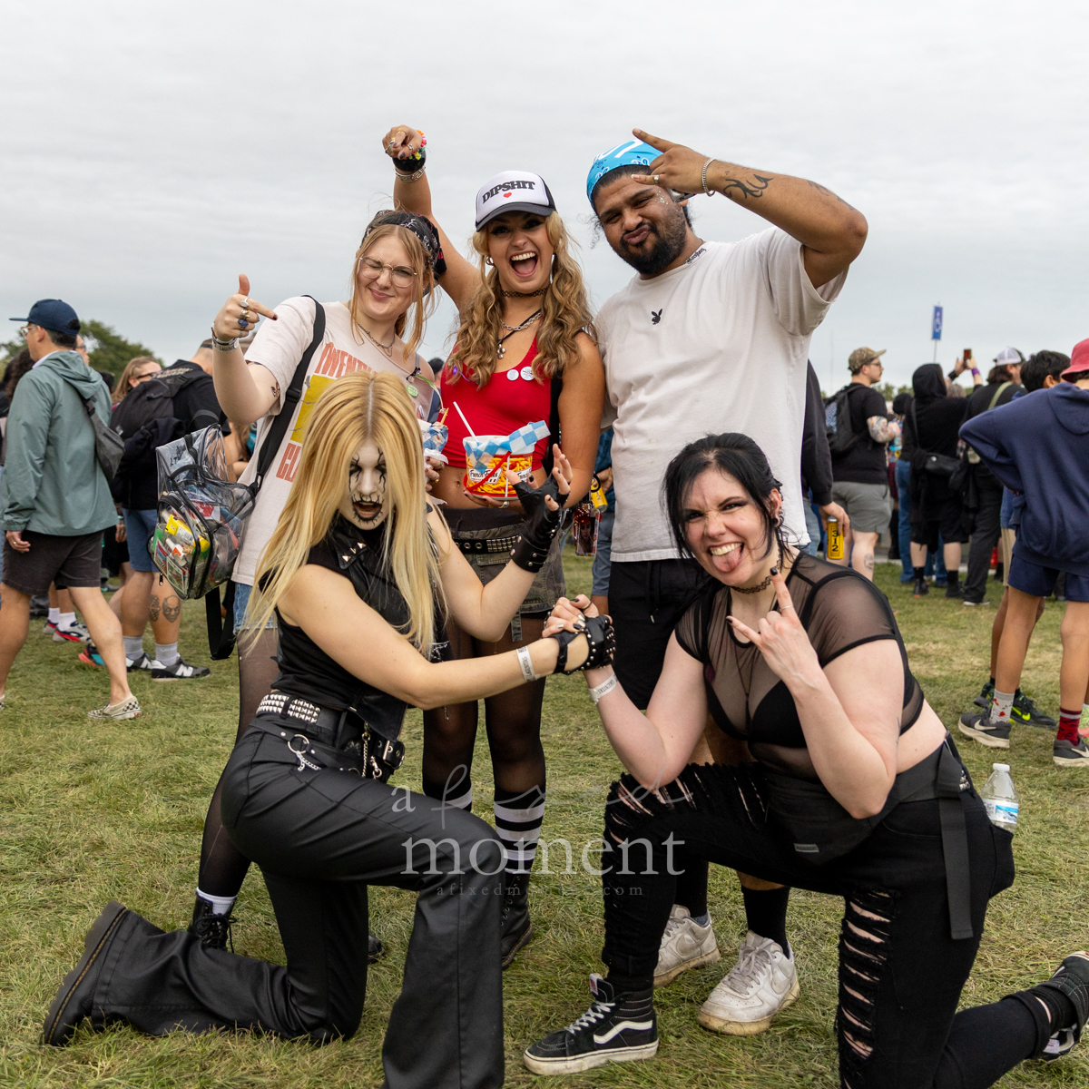Festivalgoers pose for a portrait at Riot Fest 2026