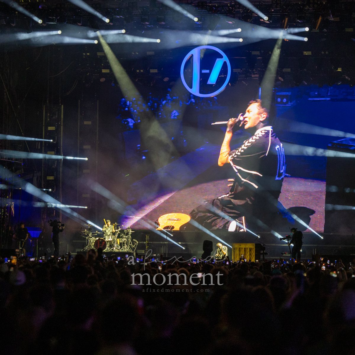 Twenty One Pilots perform before a large nighttime crowd at Riot Fest 2026