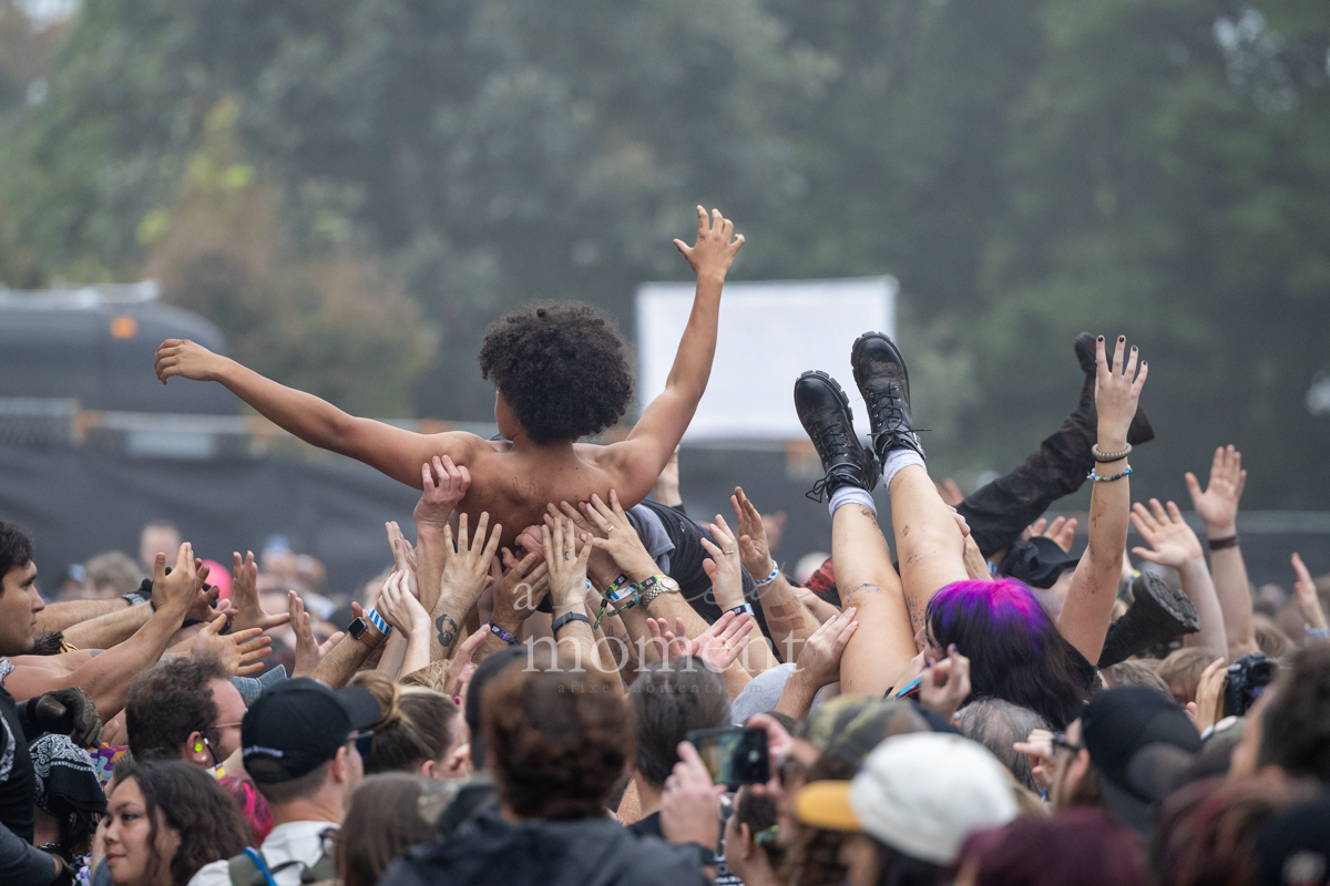 Two fans crowd surf simultaneously during Gogol Bordello at Riot Fest