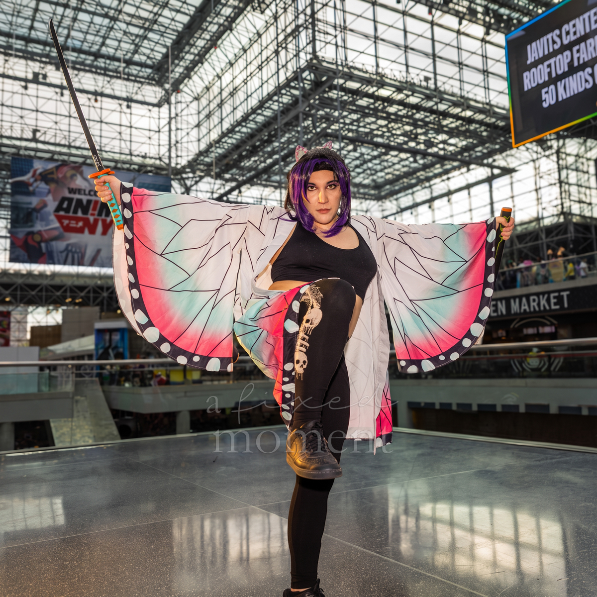 Cosplayer as a modernized Shinobu Kocho from Demon Slayer at Anime NYC 2026 Day Two