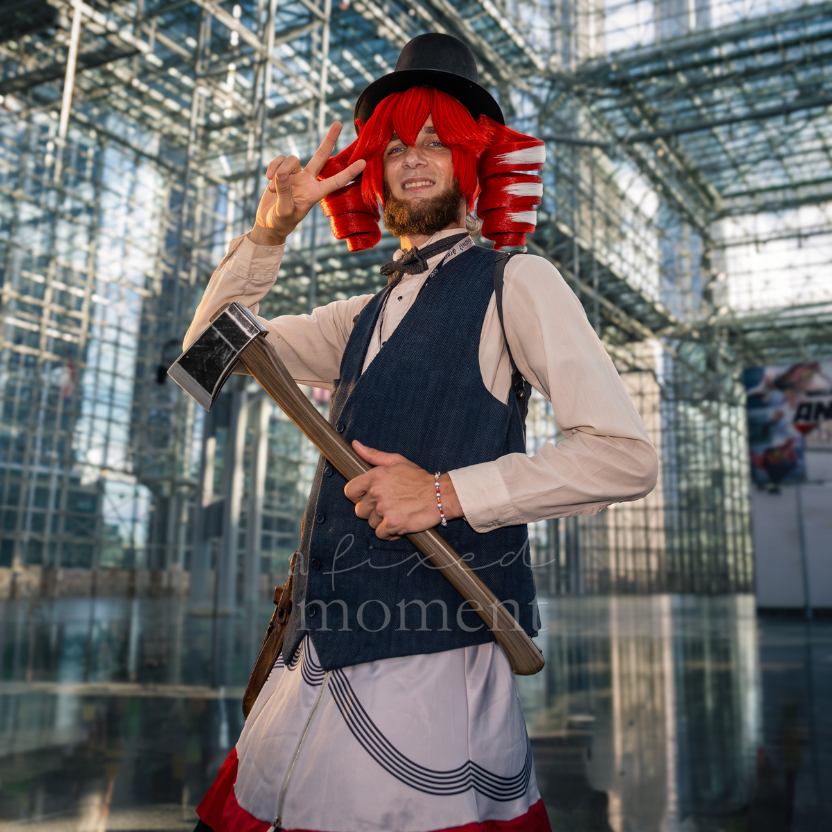 @silentzeecosplay poses with an axe prop at Anime NYC 2026 Day Two