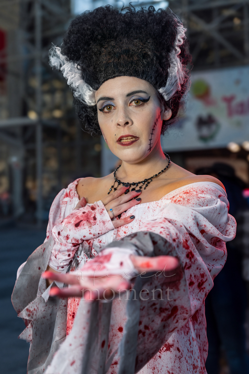 Bride of Frankenstein cosplayer with dramatic hair and makeup at New York Comic Con 2026