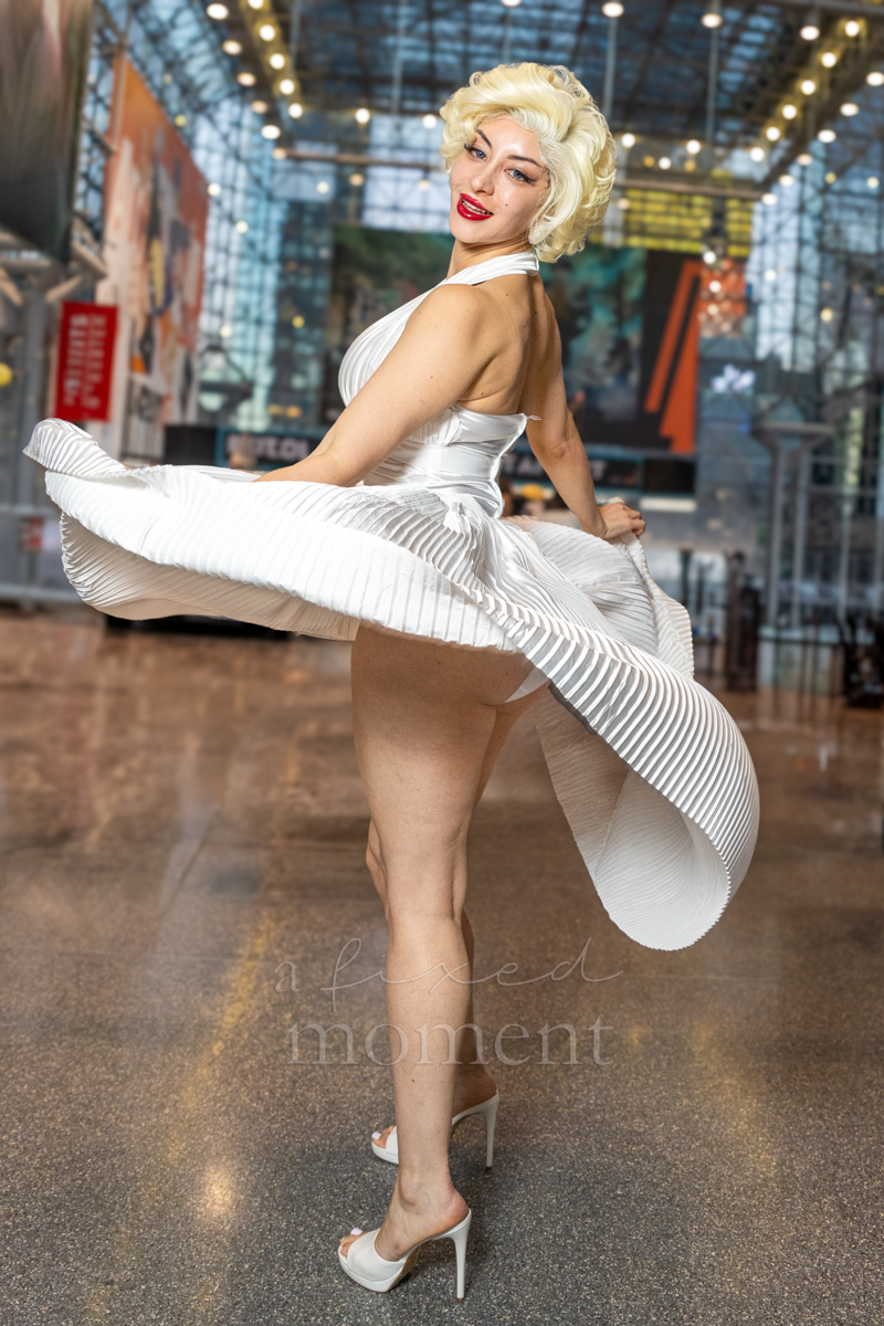 Marilyn Monroe cosplayer twirling a white dress at New York Comic Con 2026