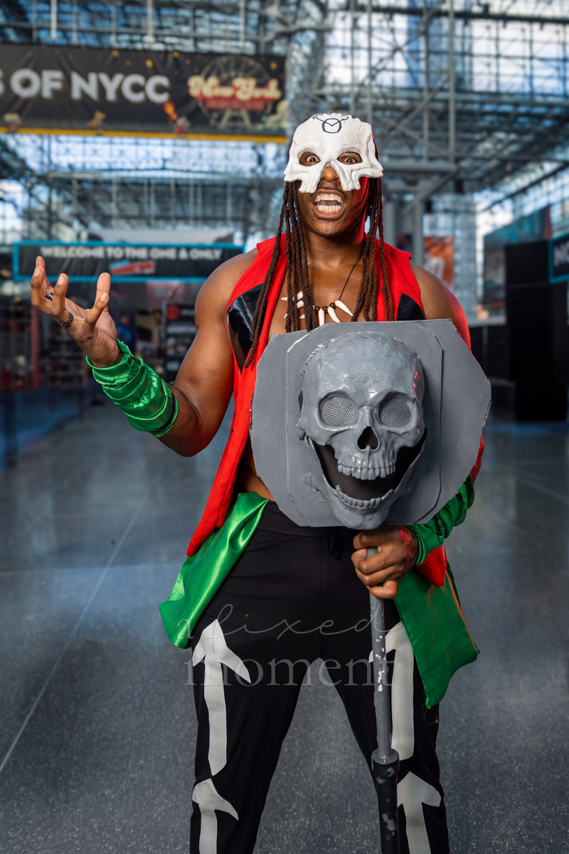 Pirate cosplayer holding a skull shield at New York Comic Con 2026