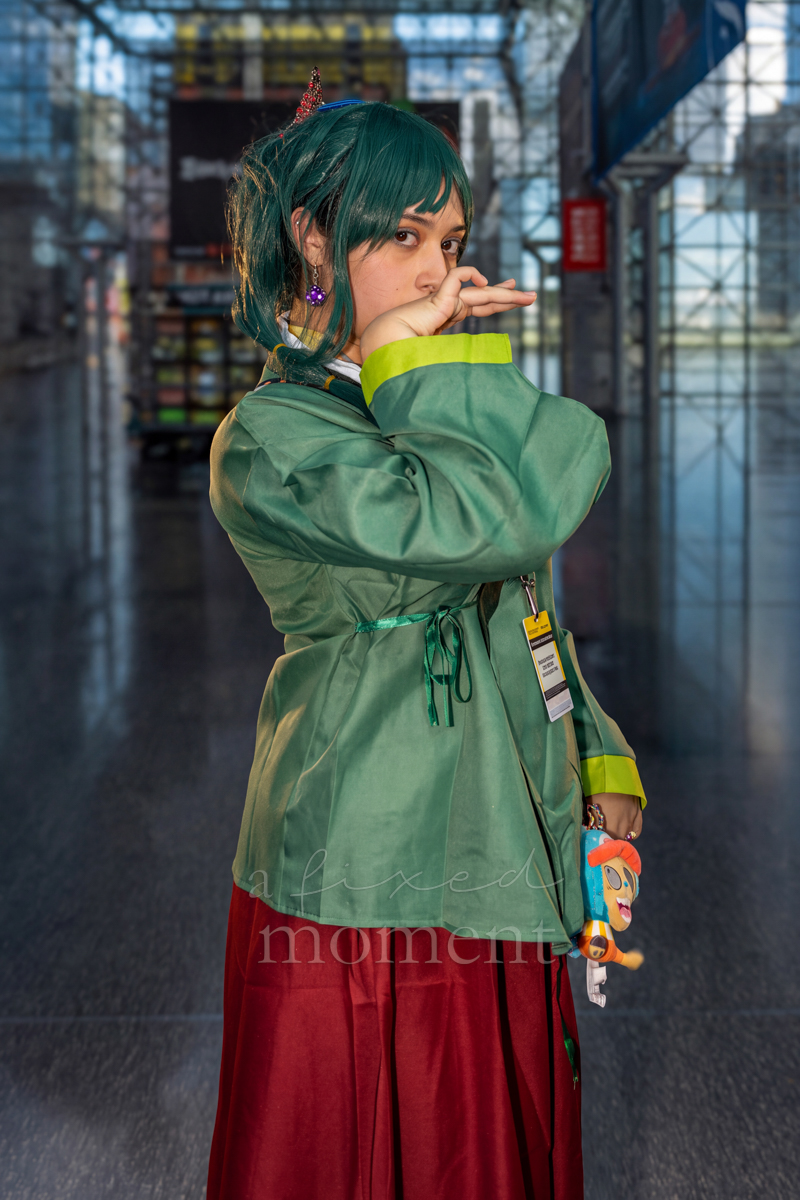 Roronoa Zoro cosplayer with green hair and swords at New York Comic Con 2026