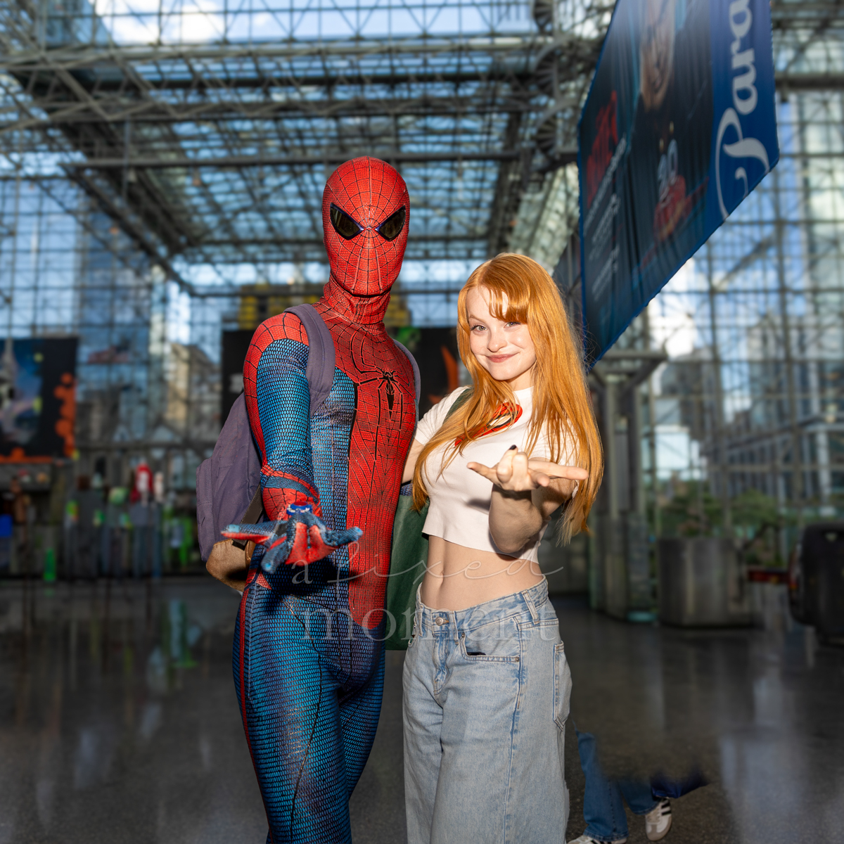 Spider-Man cosplayer posing with another attendee at New York Comic Con 2026