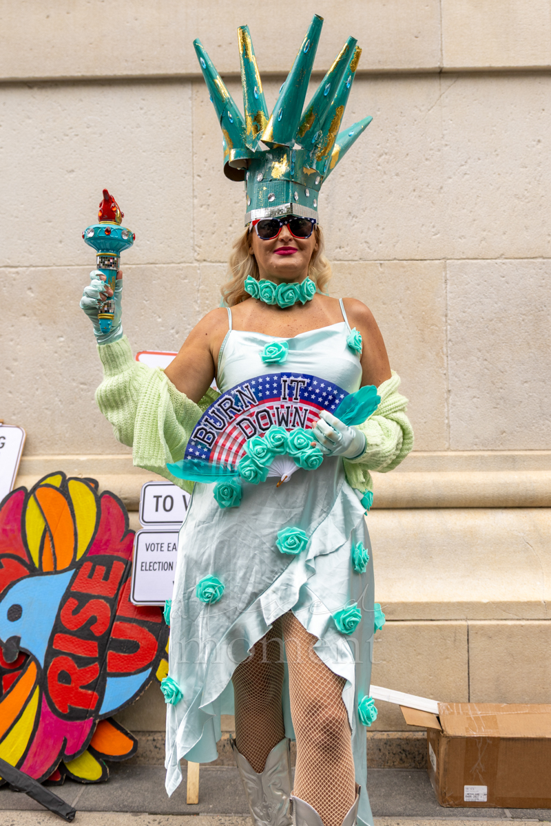 Statue of Liberty imagery appears in another attendee’s costume.